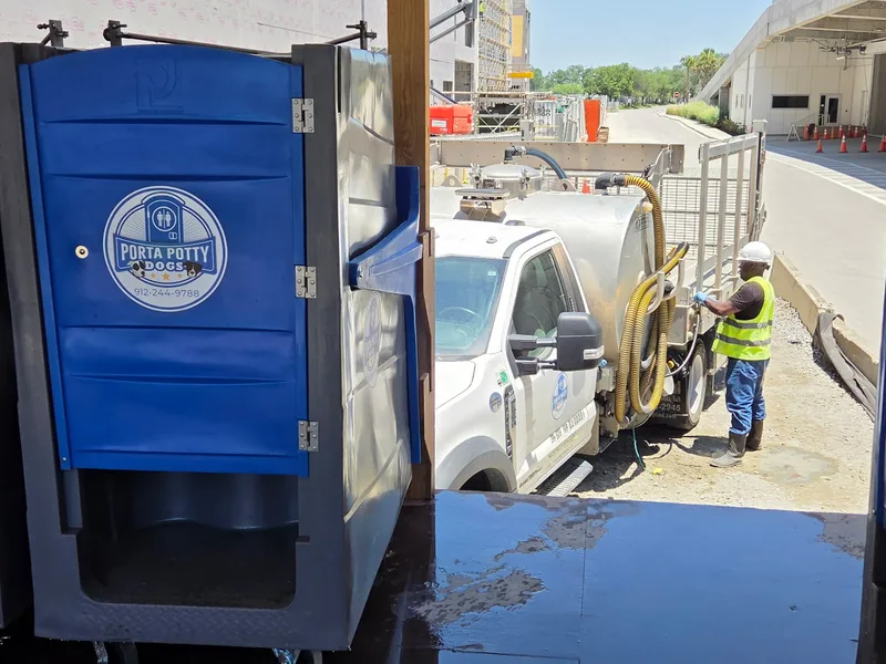 Contractor demolition job site with dumpster
