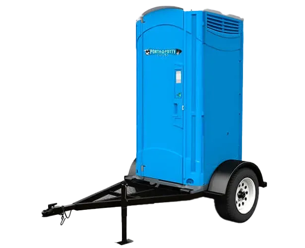 Blue dumpster mounted on trailer with two wheels and hitch.